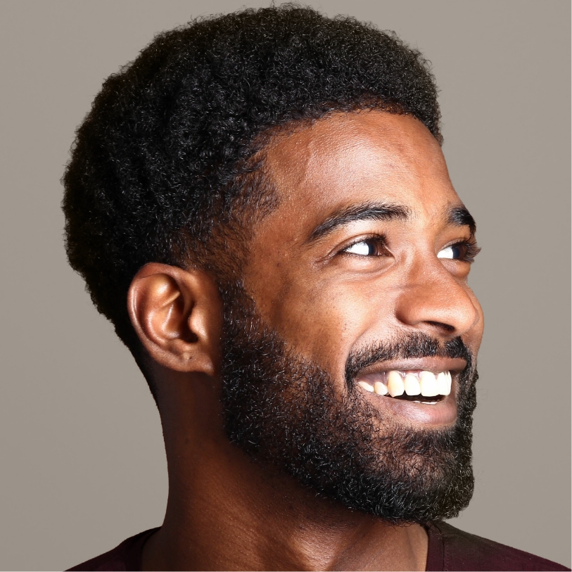 Smiling man looking to the side