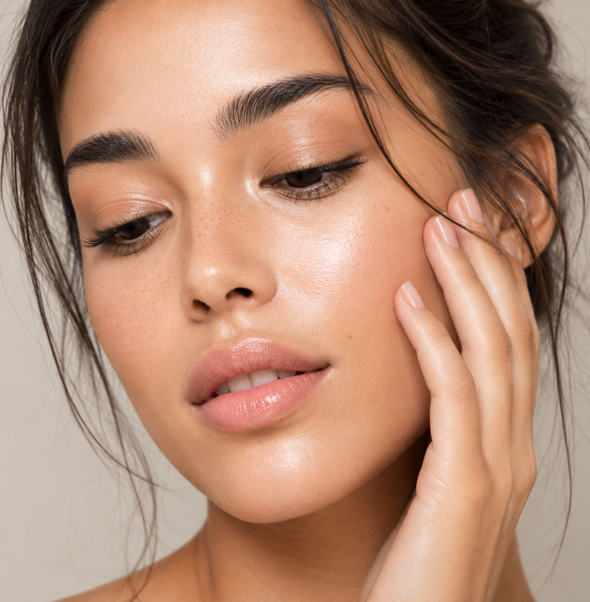 Woman with smooth, healthy-looking skin highlighting natural facial rejuvenation results.